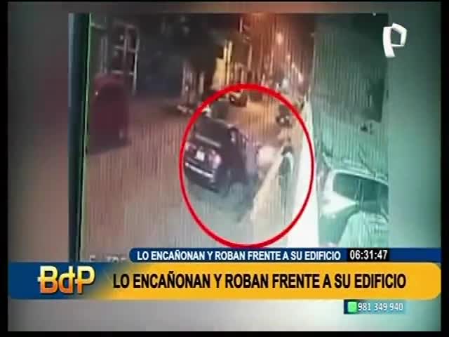 Lo encañonan y roban frente a su edificio