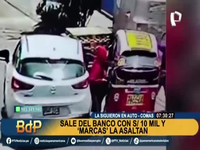 Sale de banco con 10 mil soles y marcas la asaltan 